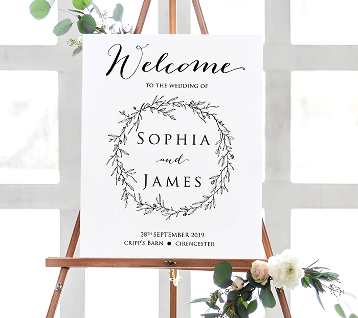 Welcome sign with floral wreath